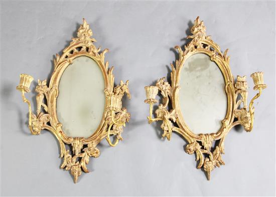 A pair of George III giltwood two light girandoles, W.1ft 3in. H.2ft